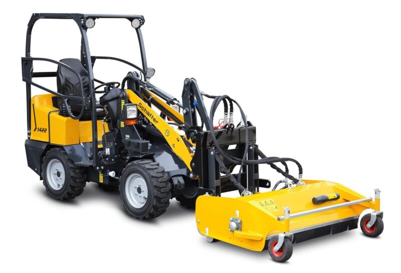 Schaffer 1422 SGT compact wheel loader with mower attachment