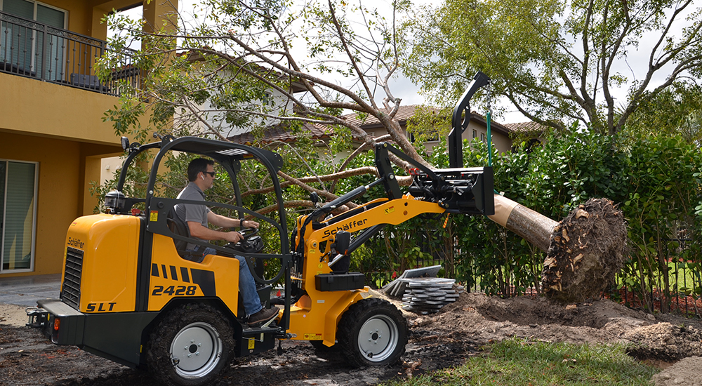 2428 SL with Tree Boom Attachment